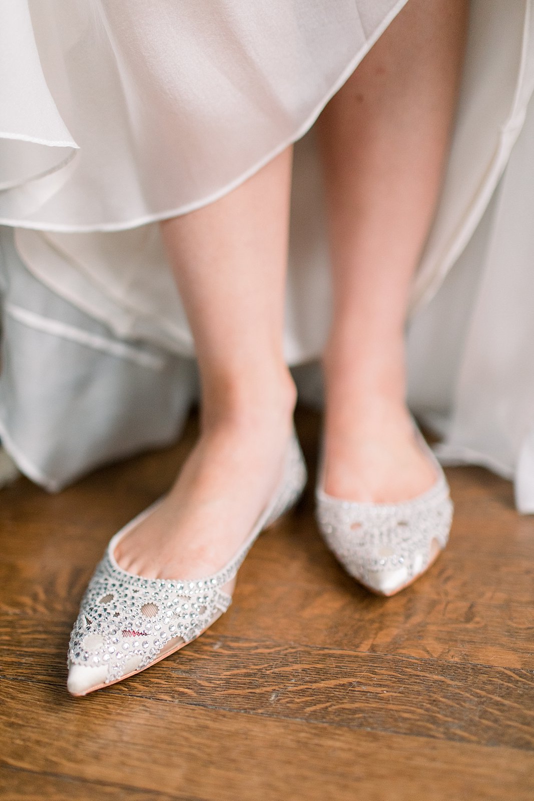bride stands in sparkly shoes at Aldie Mansion