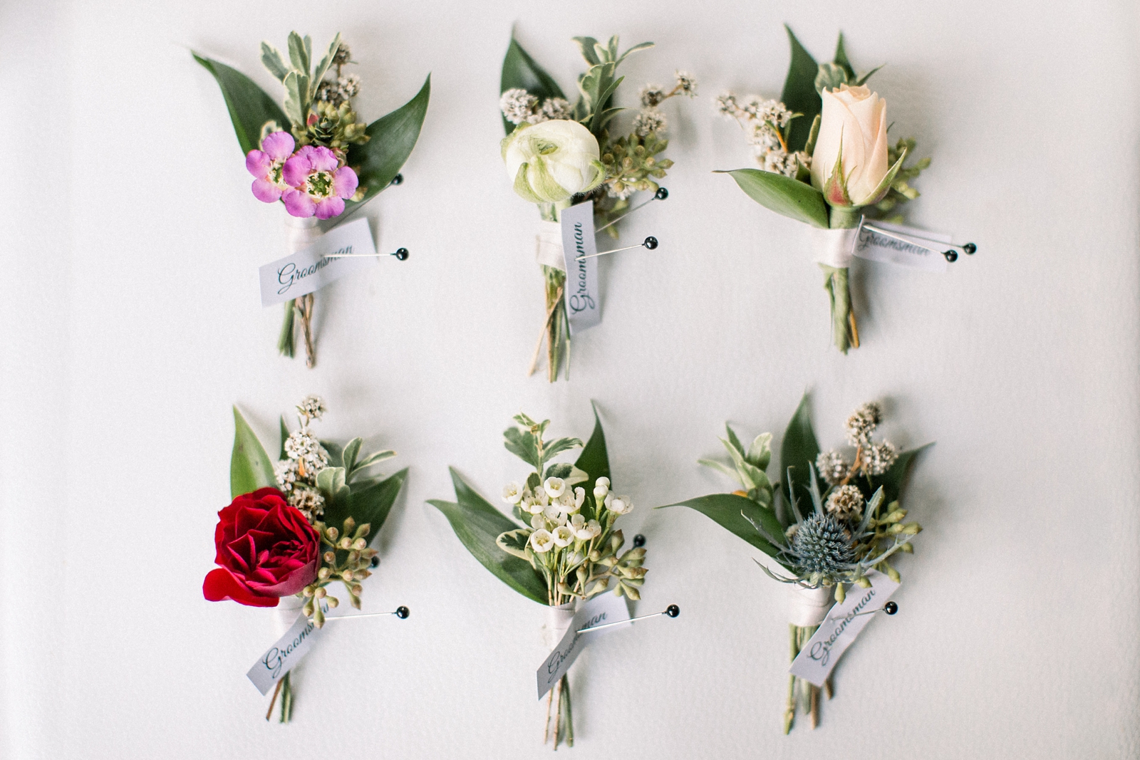 boutonnières with various wildflowers 