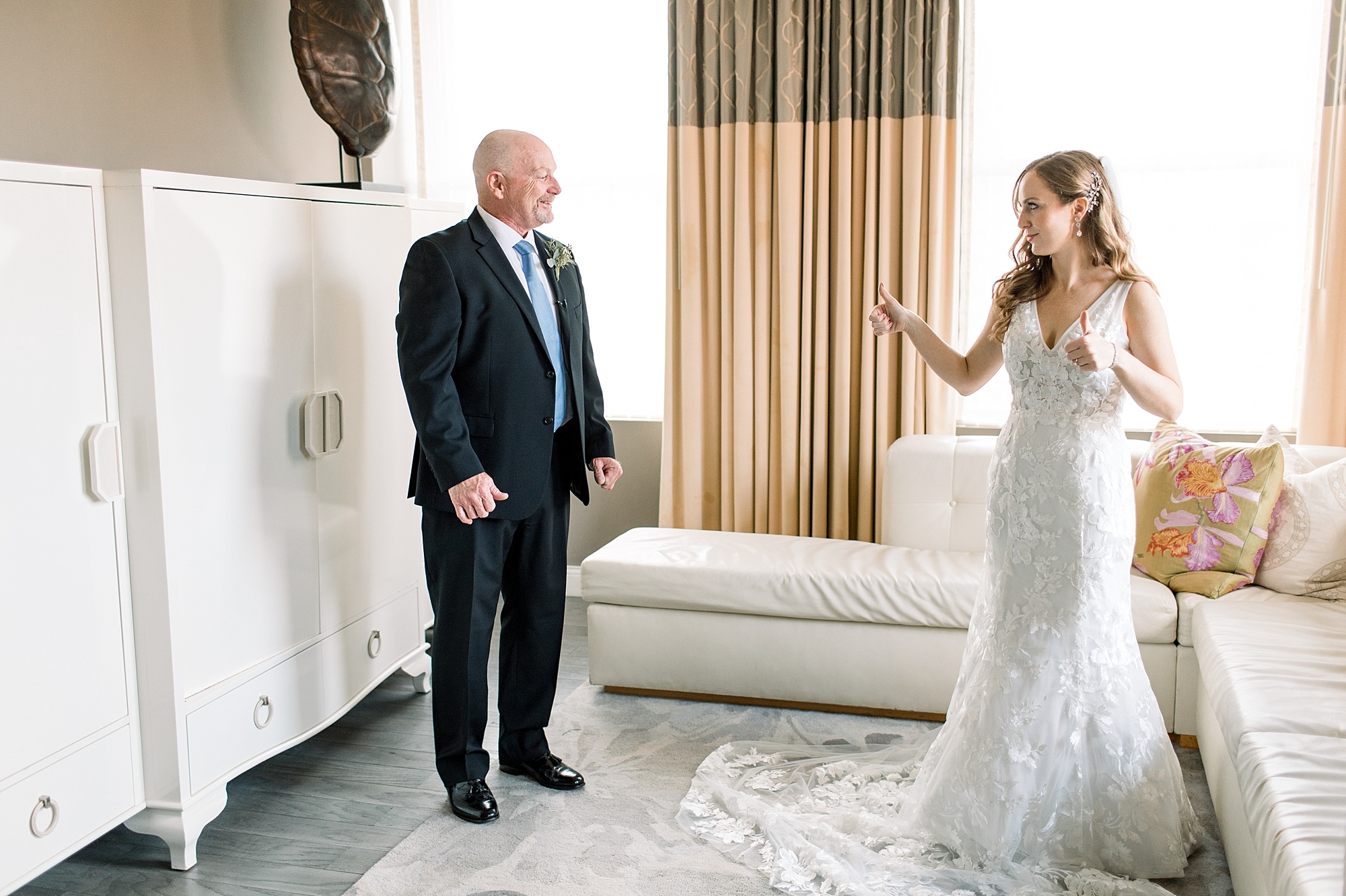 bride has first look with dad at The Hotel Monaco 