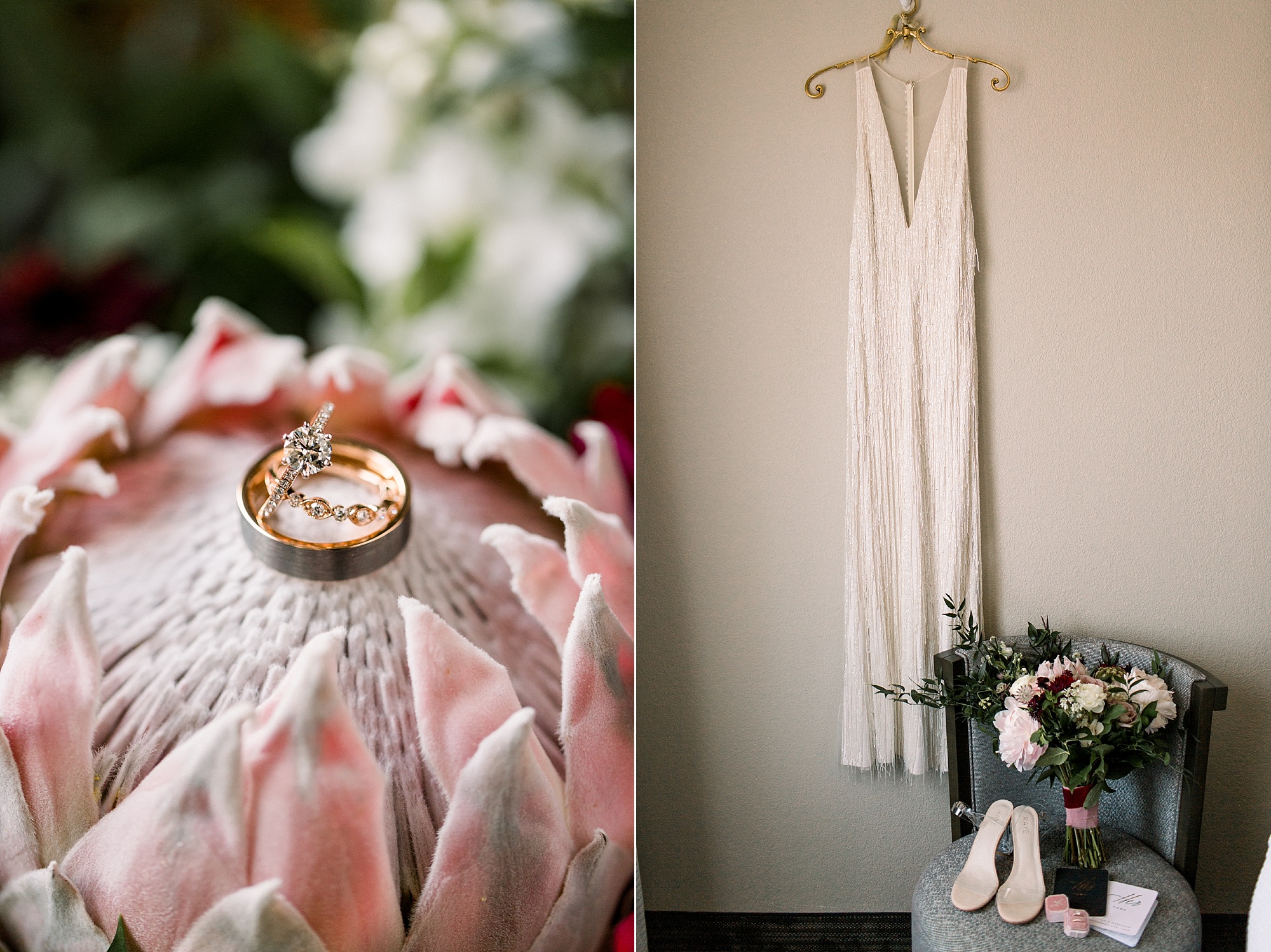 pink flower holds wedding bands and wedding dress hangs on wall 