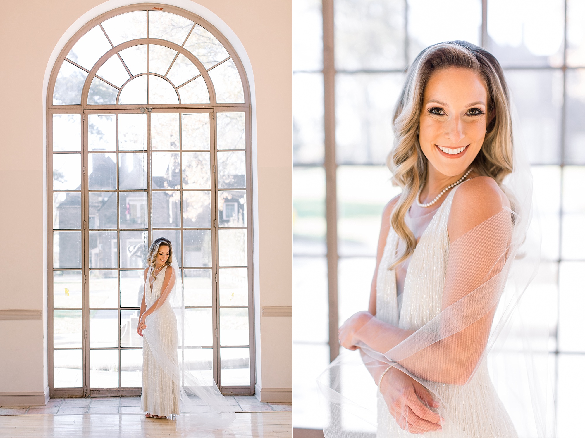 bride stands by tall window at Tyler Gardens with veil wrapped around arms 