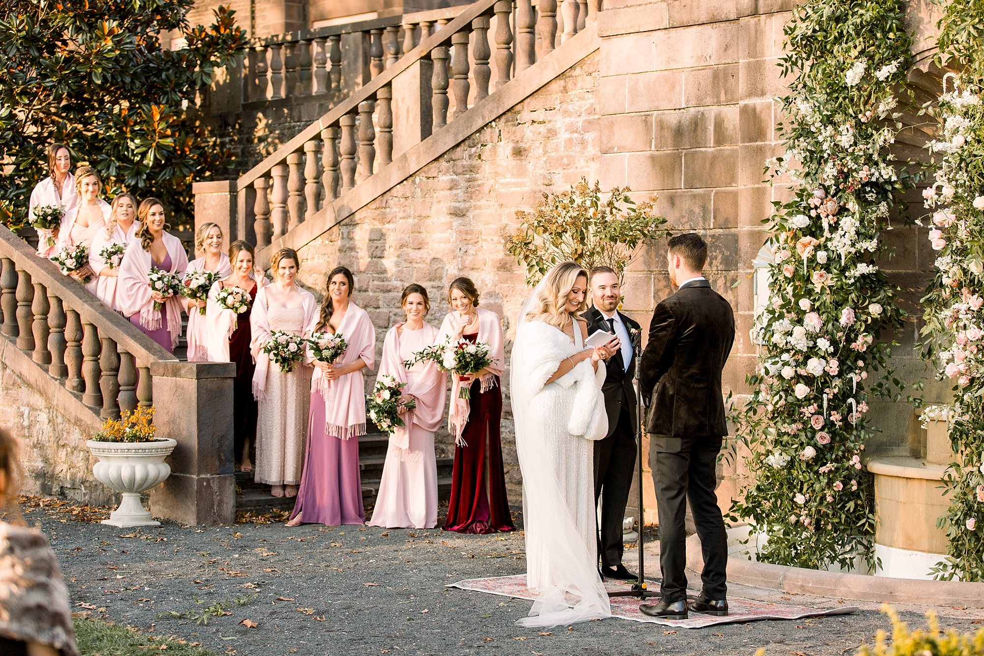 newlyweds exchange vows during Tyler Gardens wedding ceremony in courtyard