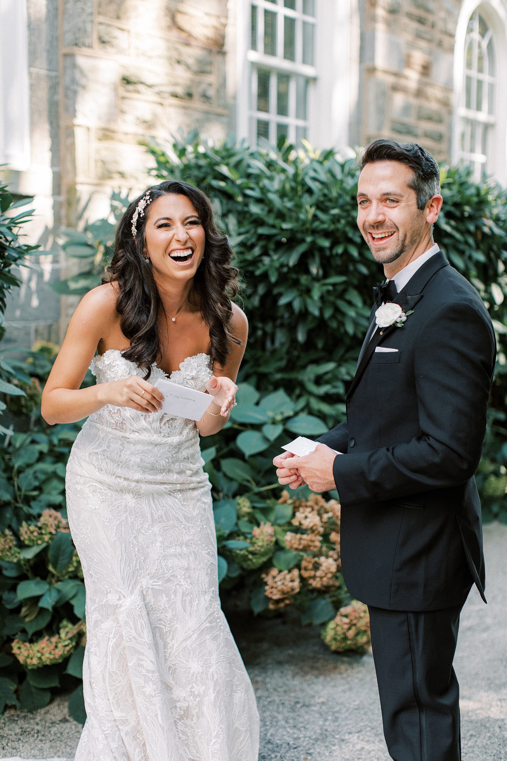 bride and groom laugh together in gardens at The Ballroom at Ellis Preserve