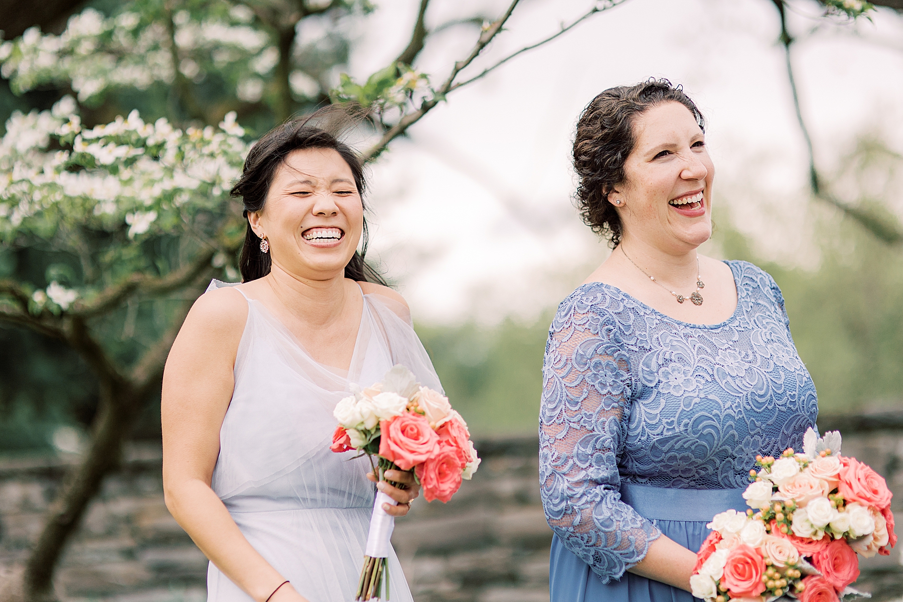 bridesmaids laugh during wedding ceremony at Bellevue Hall