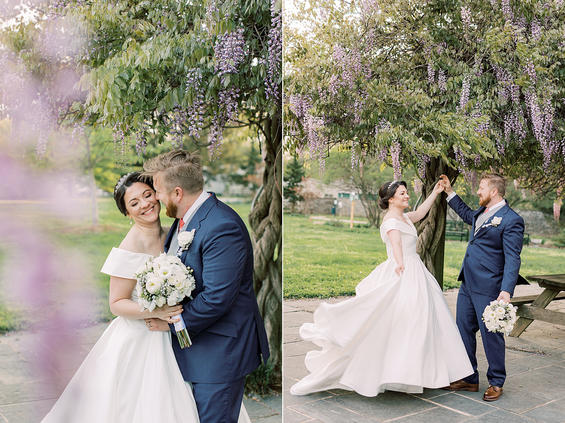 groom in navy suit kisses bride's cheek and twirls her under wisteria at Bellevue Hall