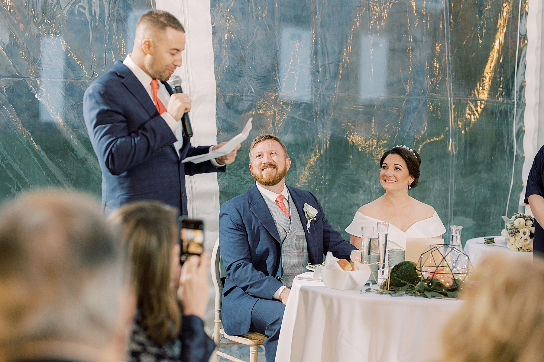 best man reads speech to bride and groom 