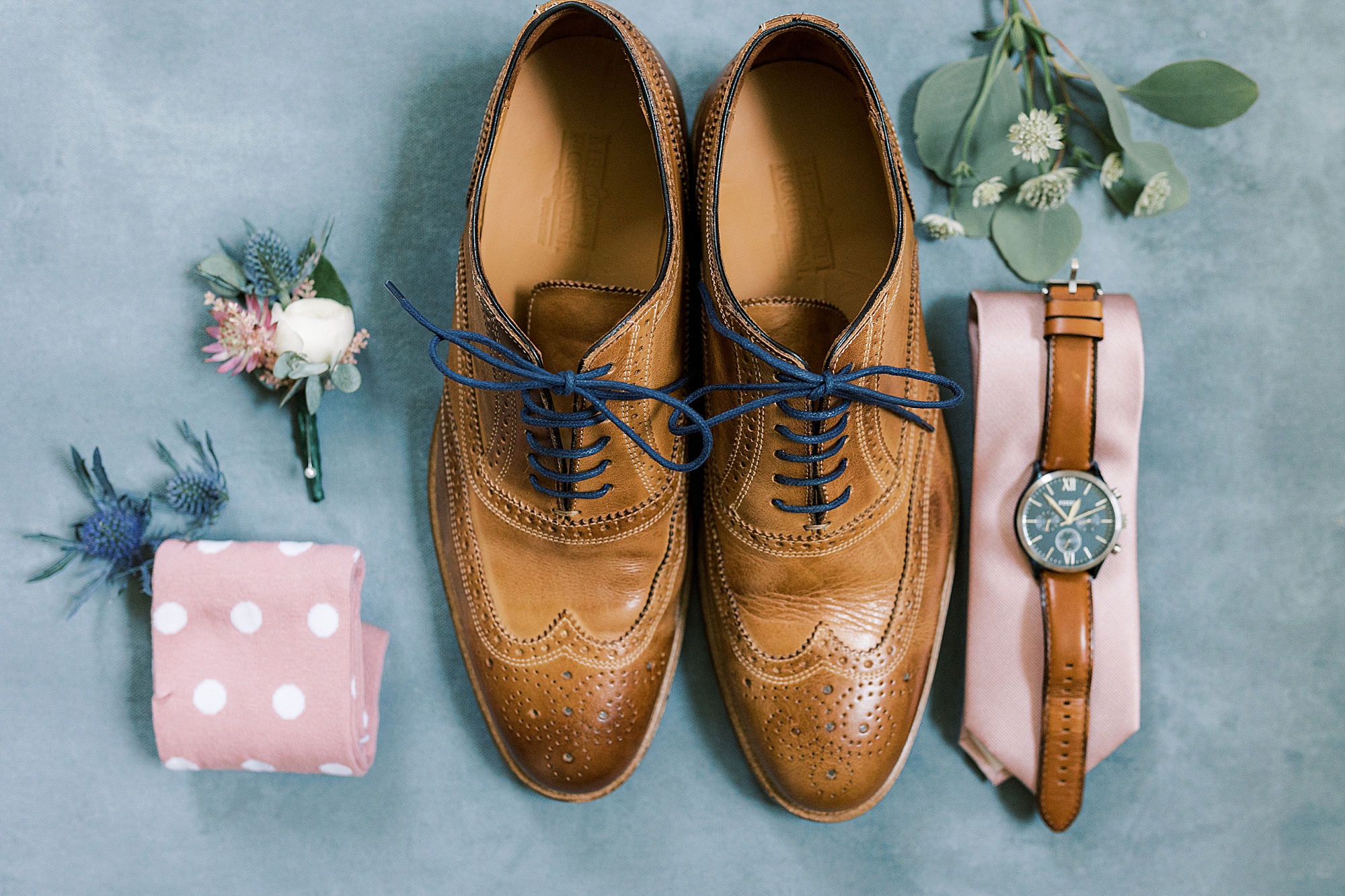 groom's brown shoes with pink tie and watch for wedding day at The Farm at Eagles Ridge 