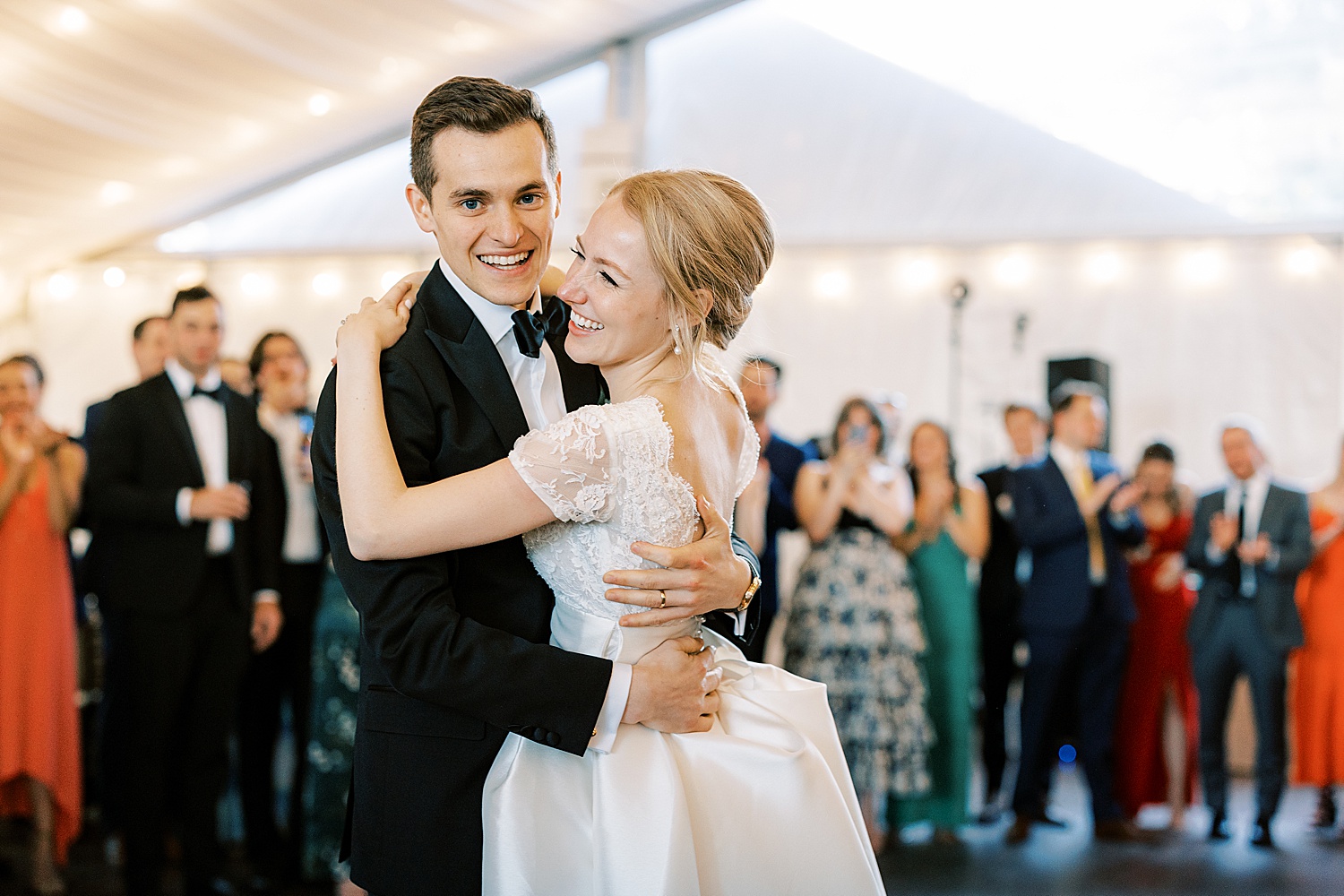 bride and groom dance smiling during Philadelphia PA wedding reception