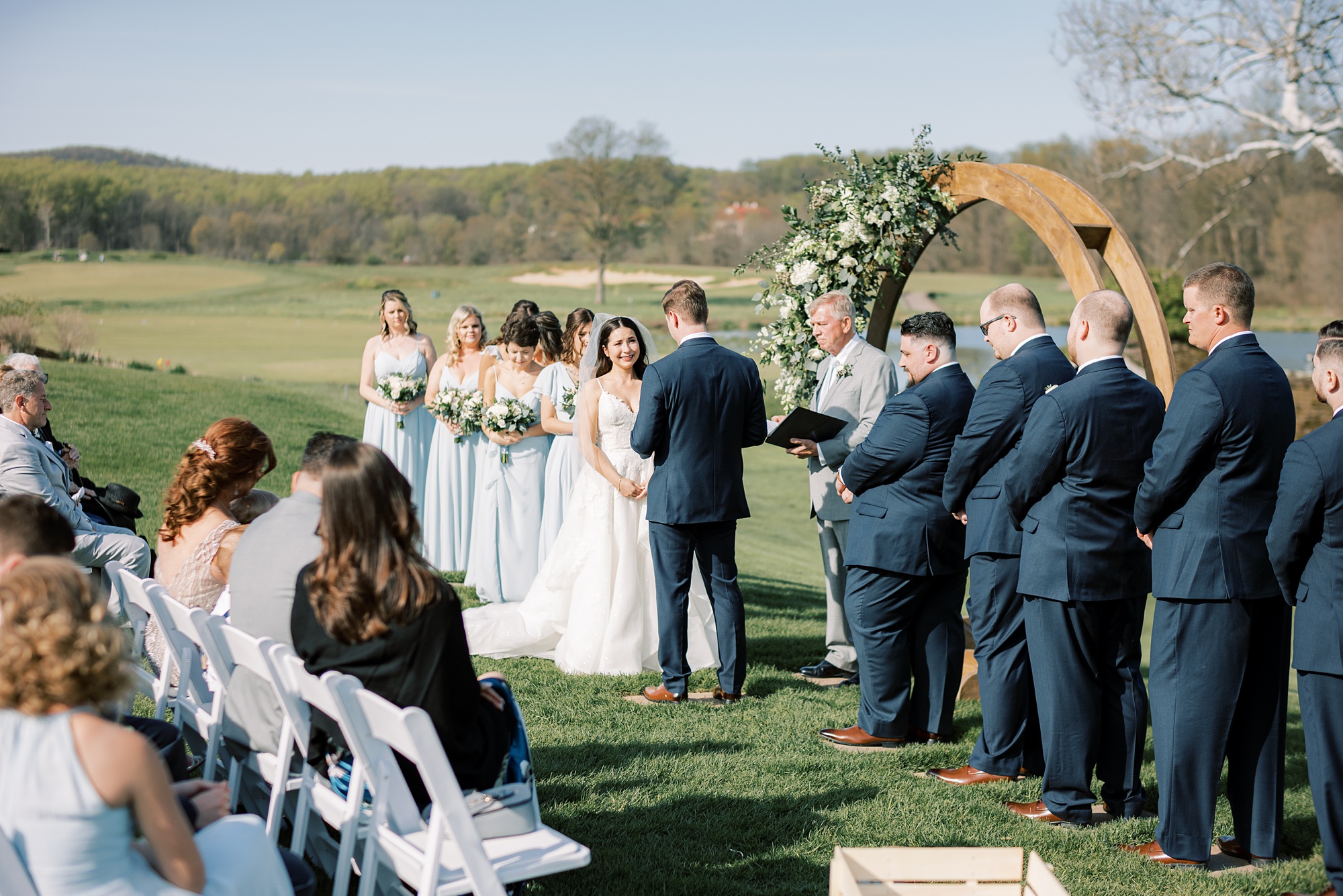outdoor wedding ceremony on the lawn of French Creek Golf Club