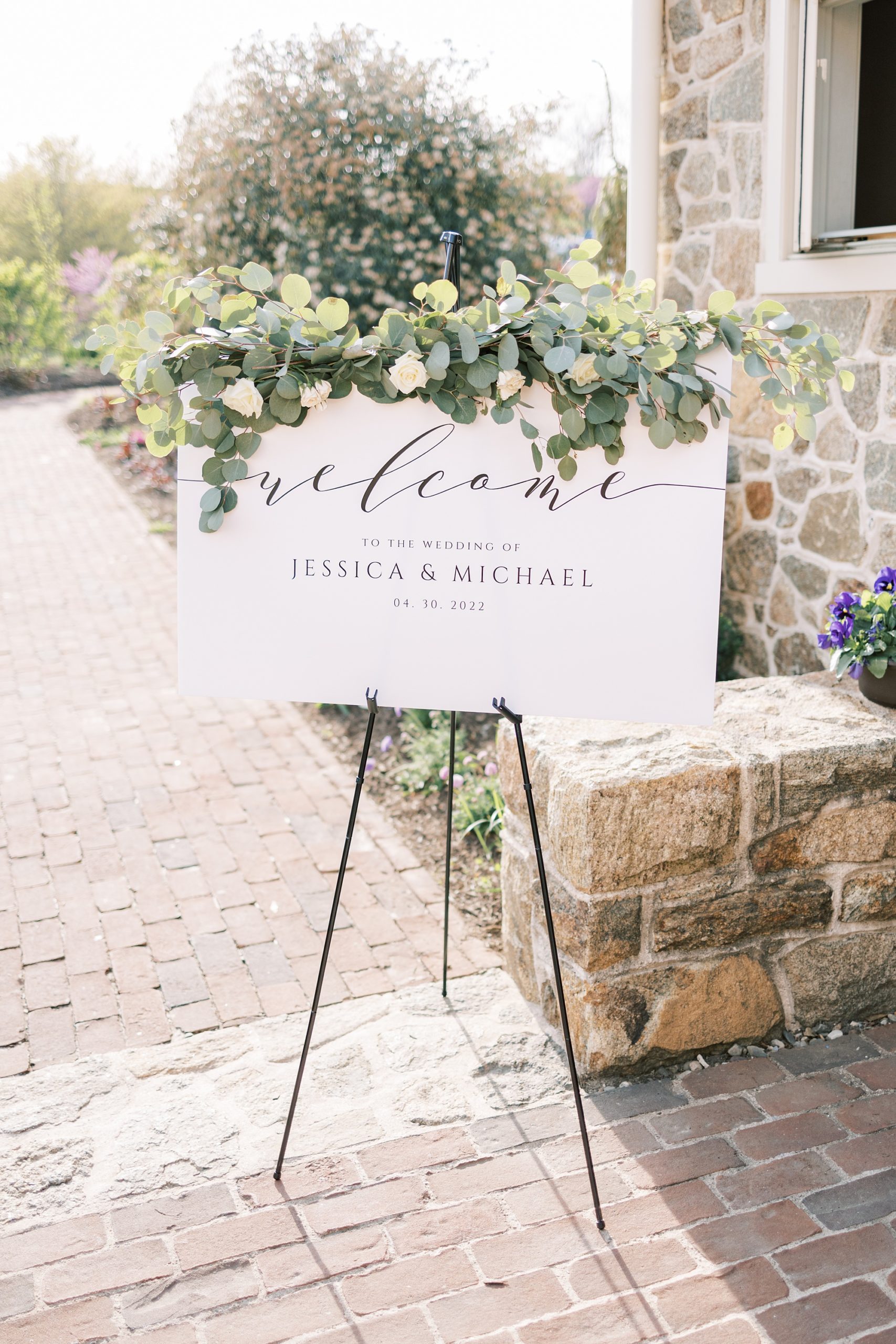 welcome sign with greenery outside reception at French Creek Golf Club 
