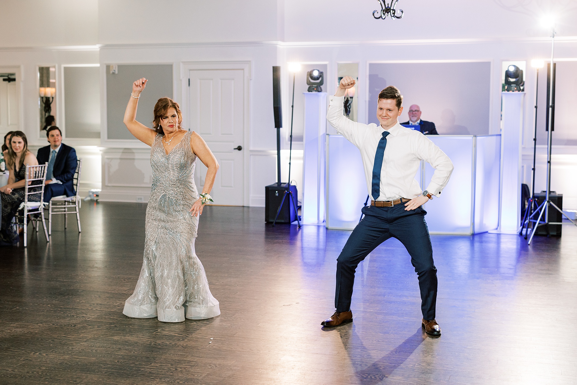 groom and mom dance together during Chester County PA wedding reception