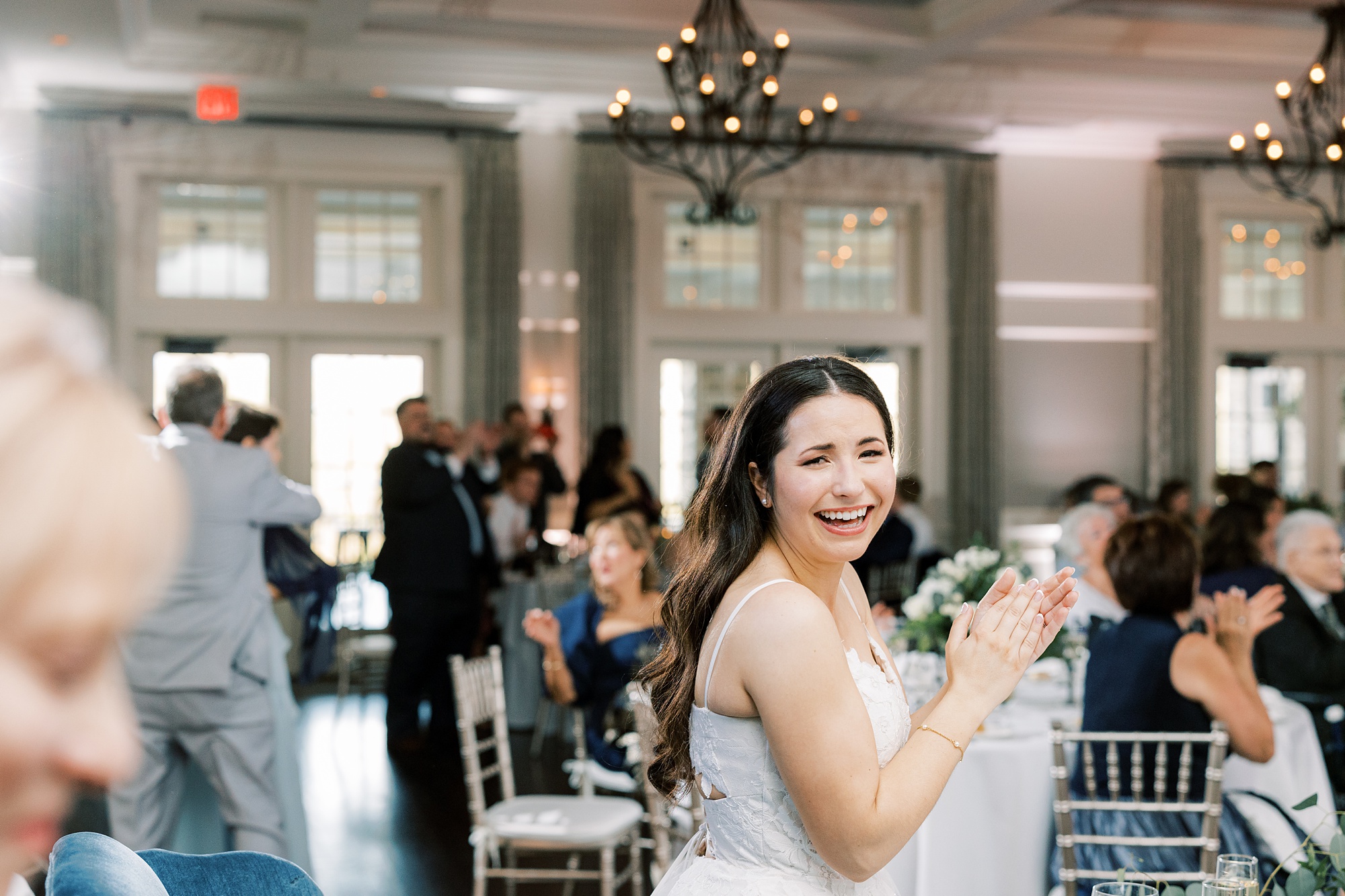 bride laughs during Chester County PA wedding reception