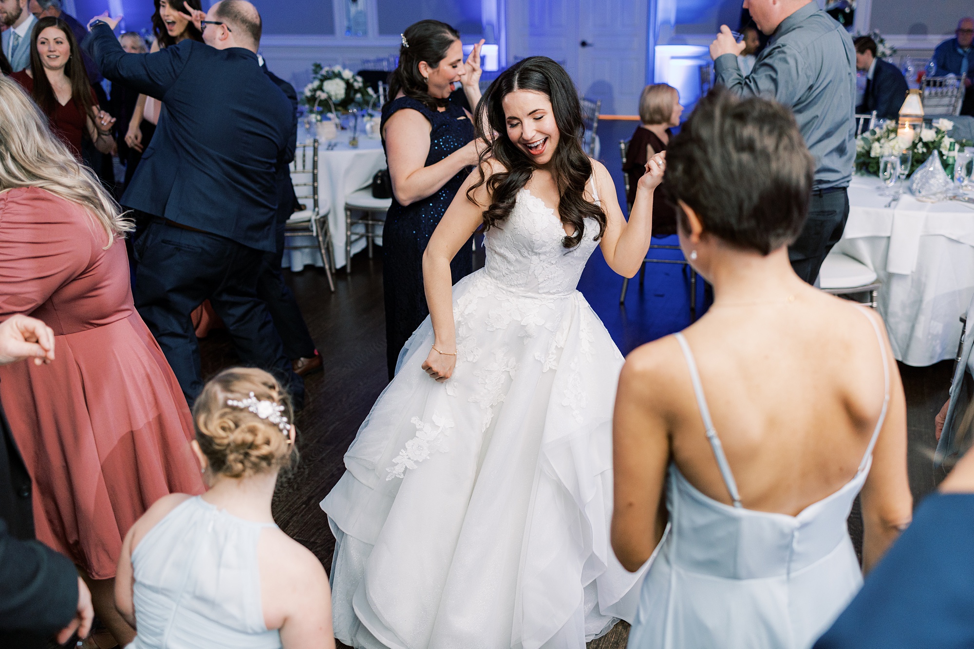 bride dances with guests during Chester County PA wedding reception