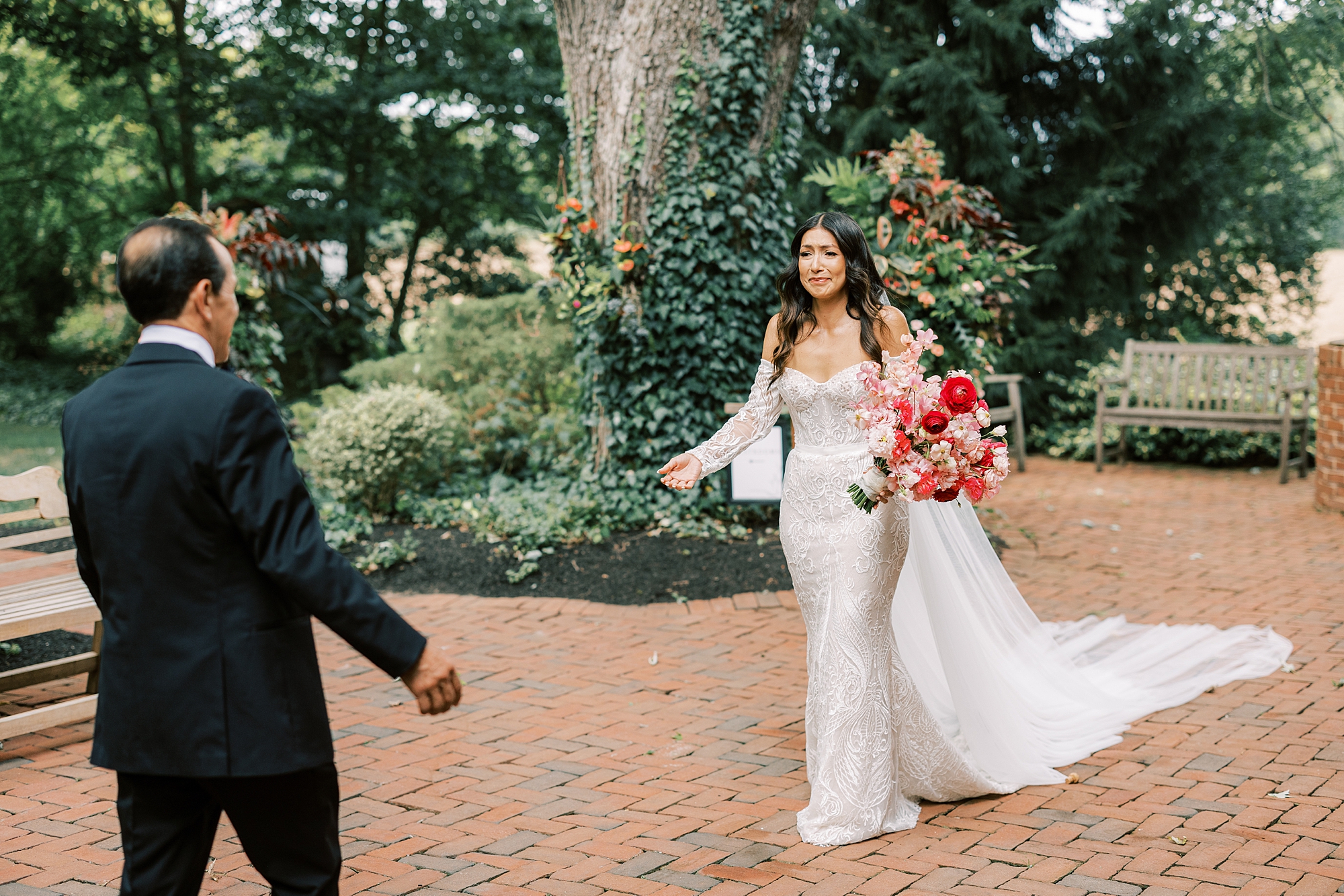 bride approaches father for first look at The Cypress House