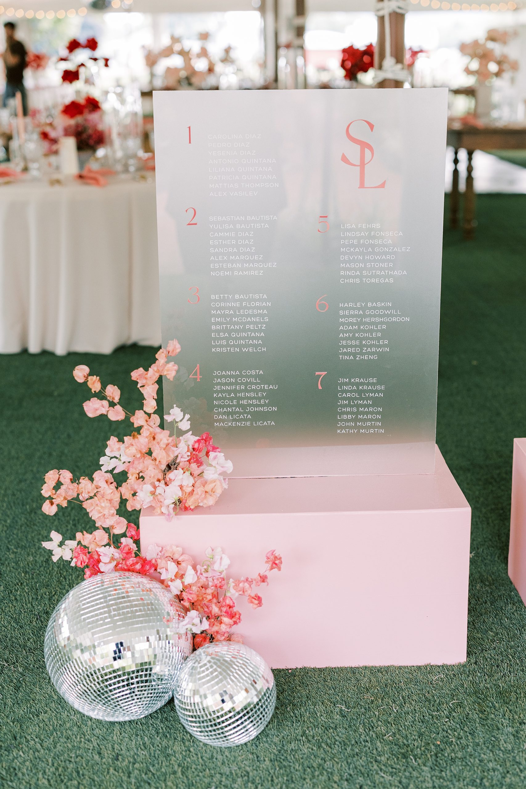 pink acrylic seating chart signs with disco balls