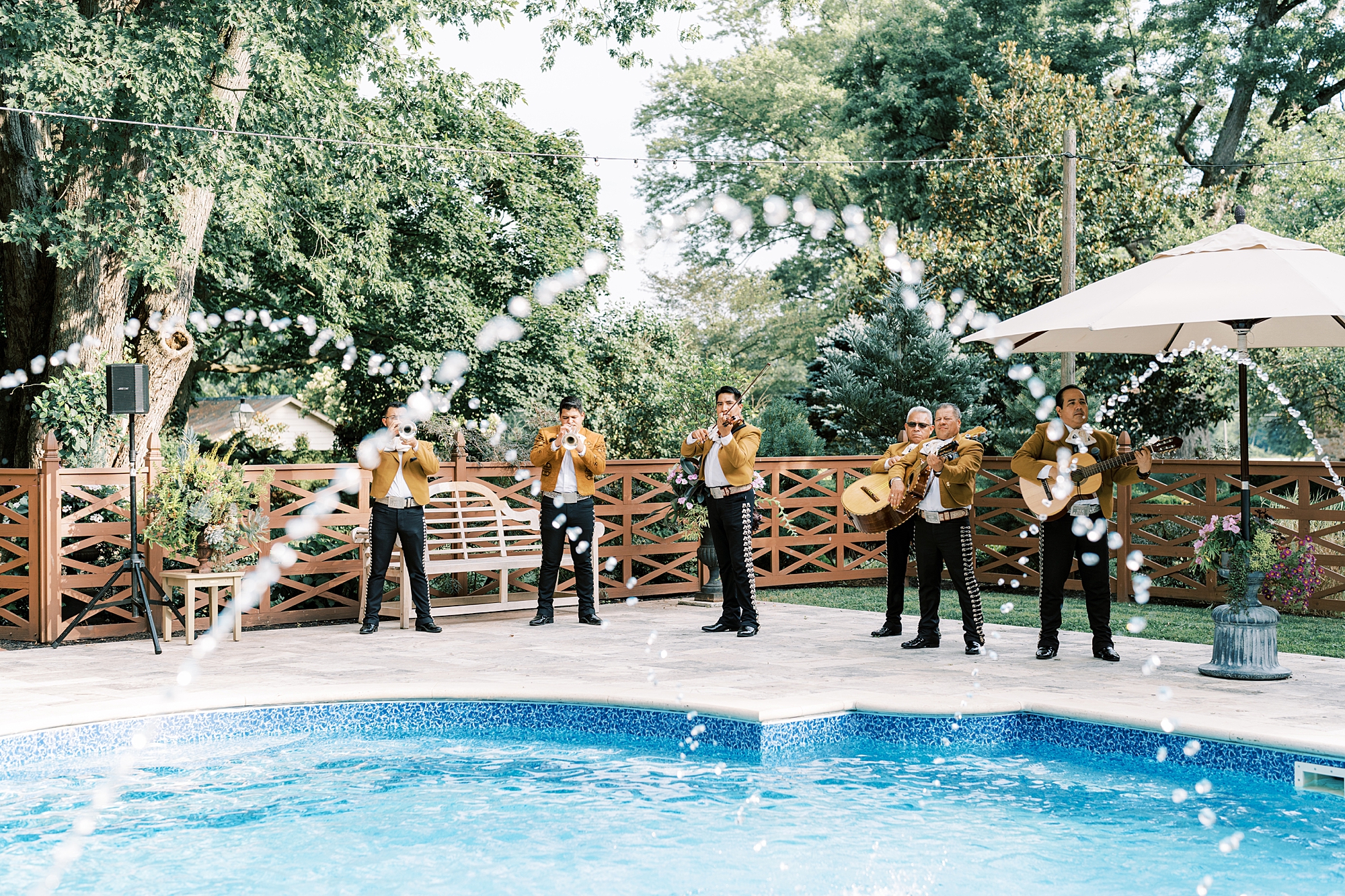 mariachi band plays poolside at The Cypress House