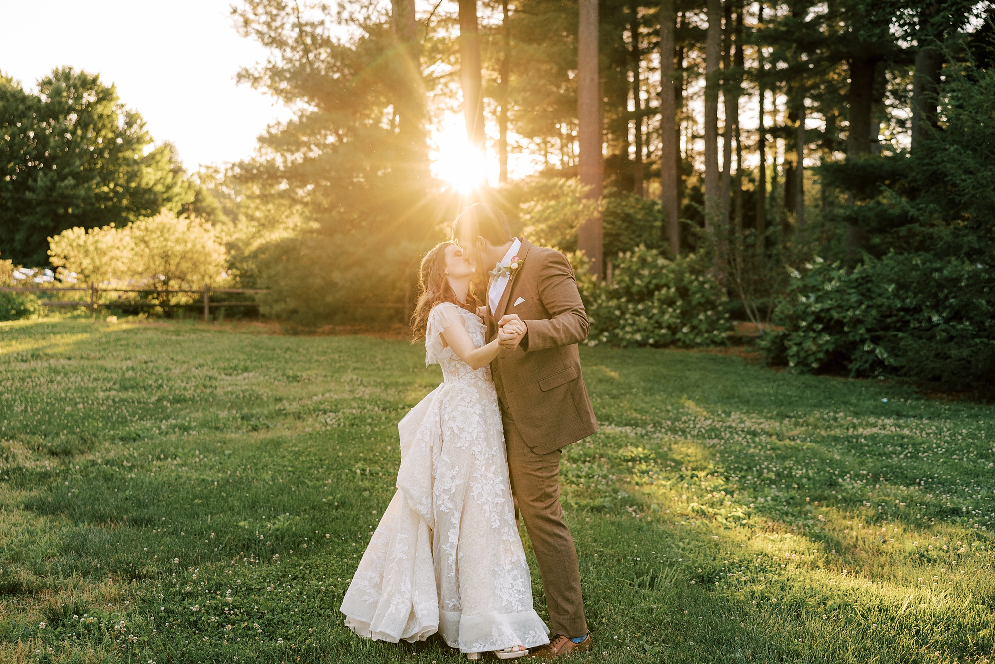 groom and bride dance during sunset portraits in Media PA