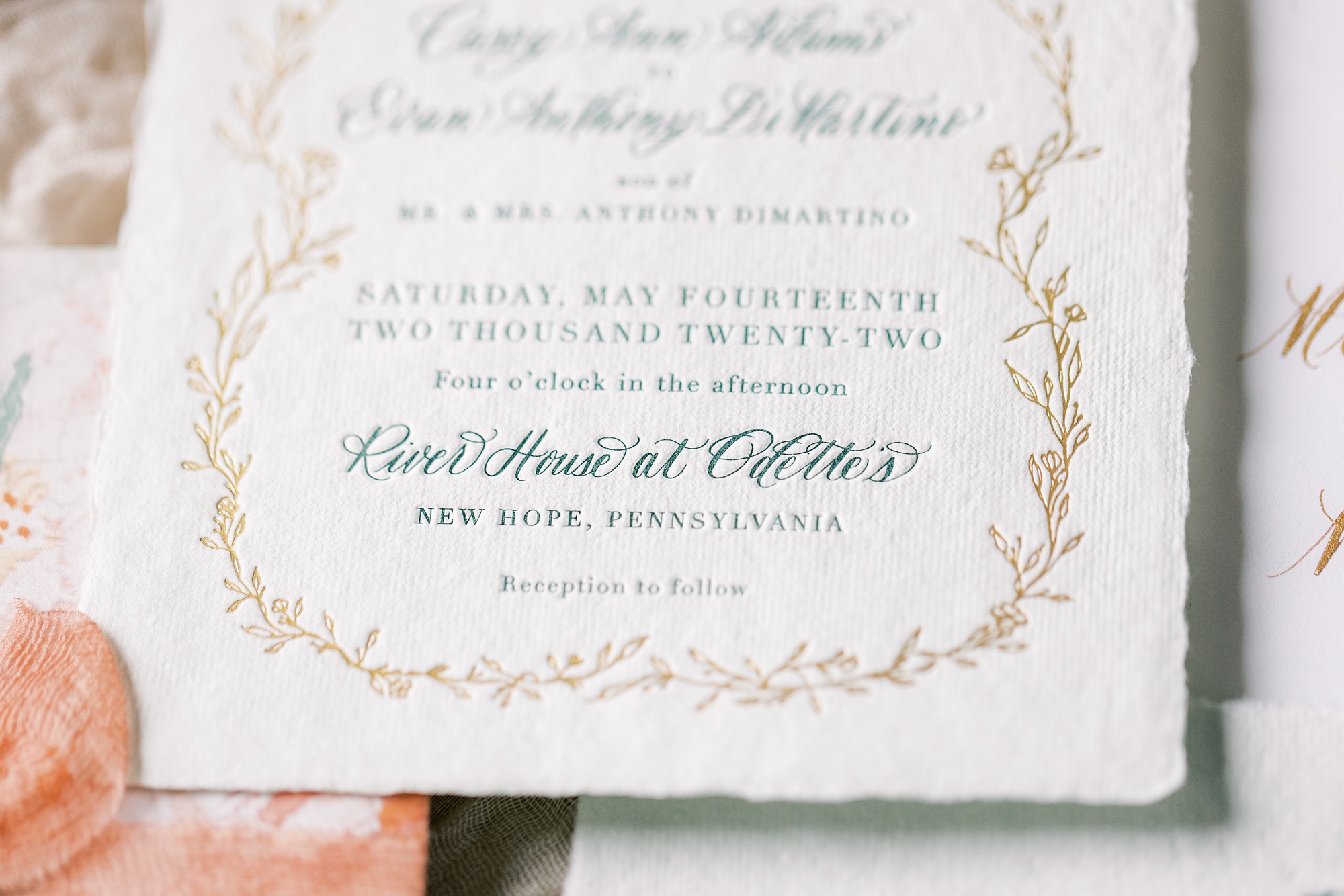 elegant invitation with teal and gold embossing 