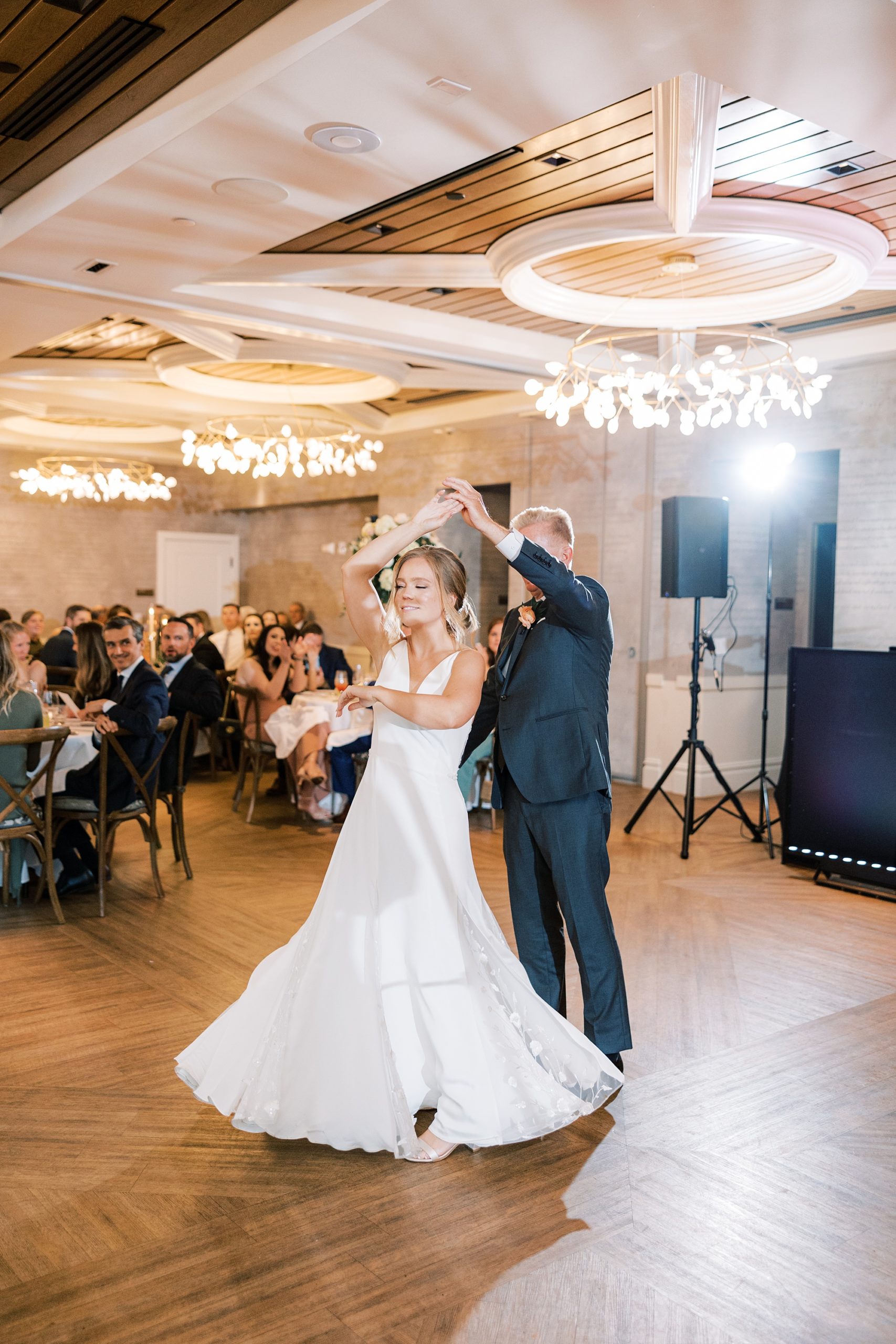 father twirls bride during New Hope PA wedding reception 