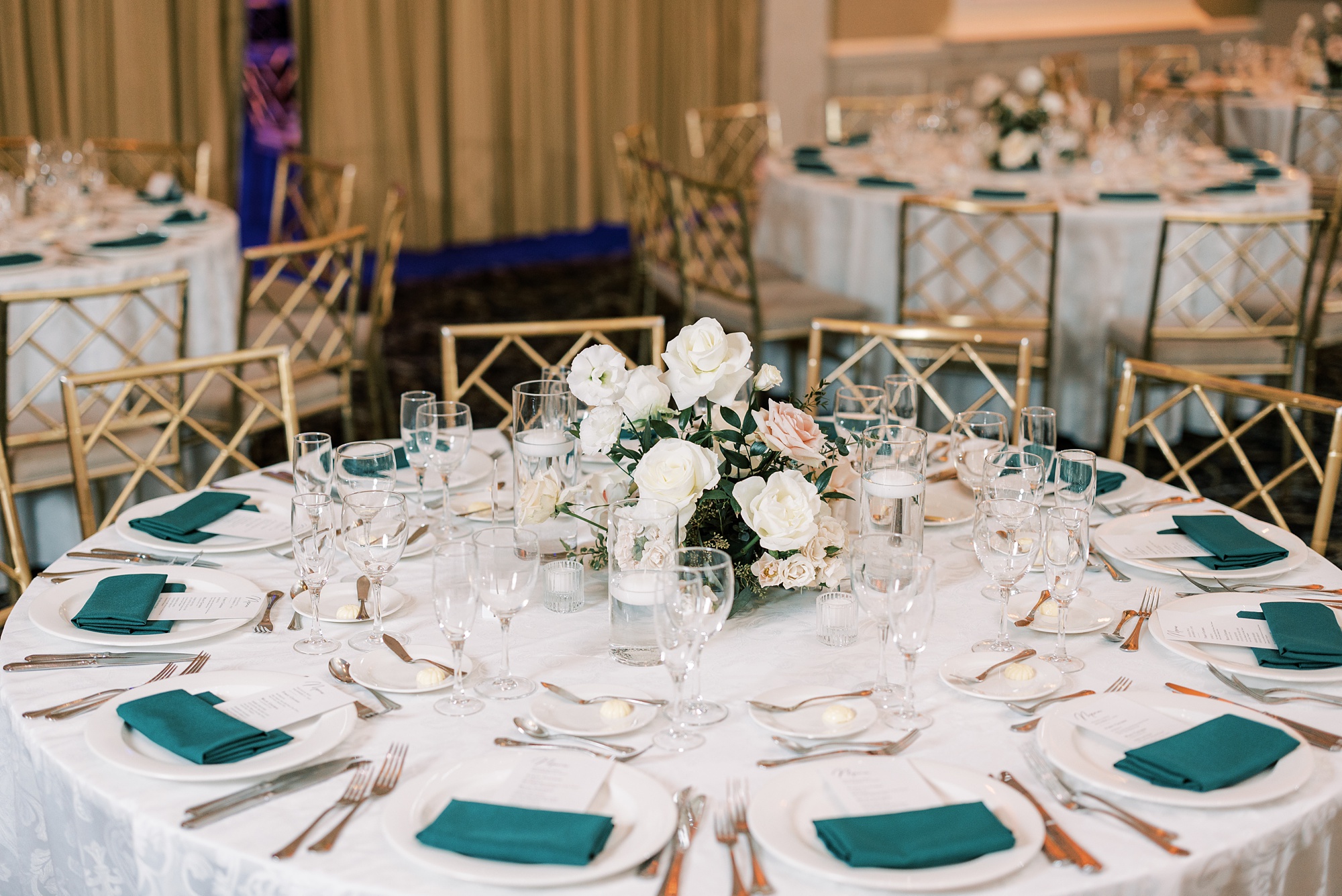 The Palace at Somerset Park wedding reception with gold and green details 