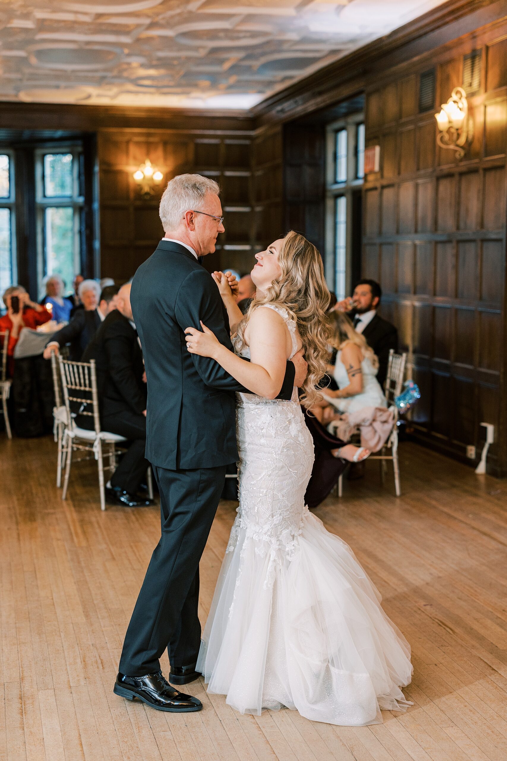 bride laughs dancing with dad during PA wedding reception 