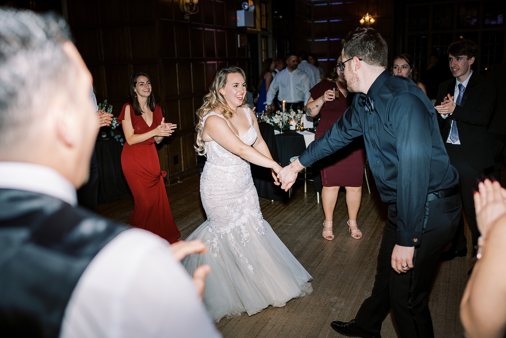 bride and groom dance together on floor during PA wedding reception 