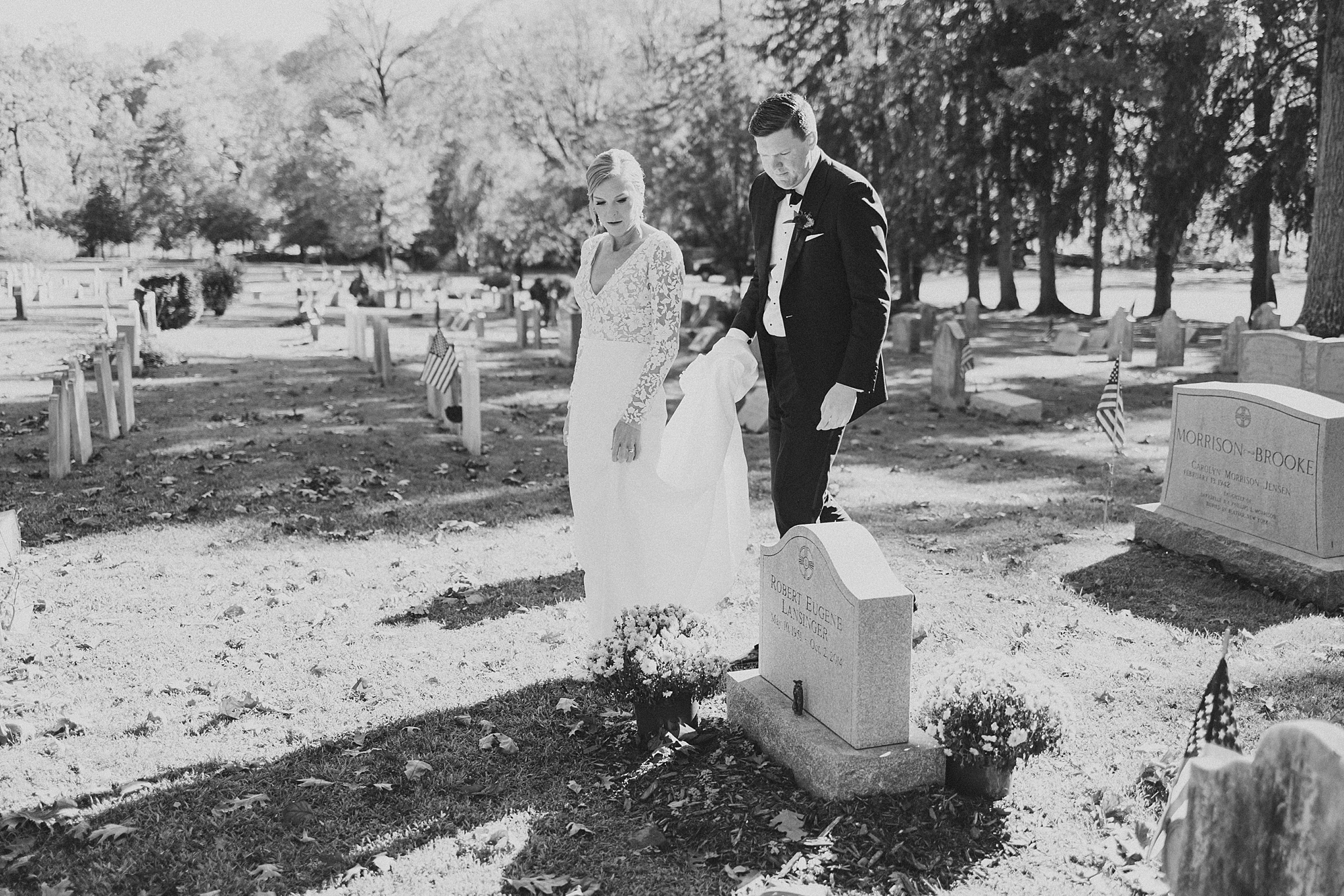 bride and groom walk in cemetery to bride's father's headstone at St. David’s Episcopal Church 