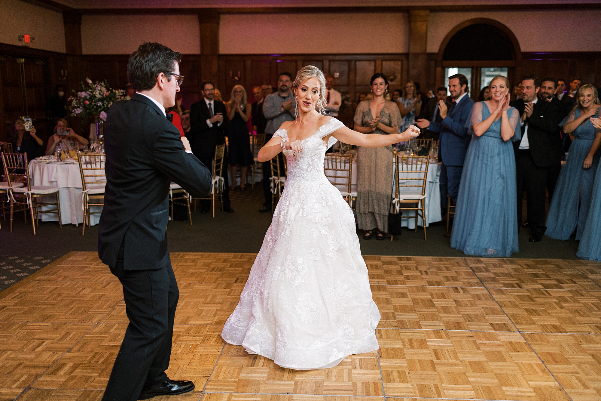 bride and groom dance during wedding reception 