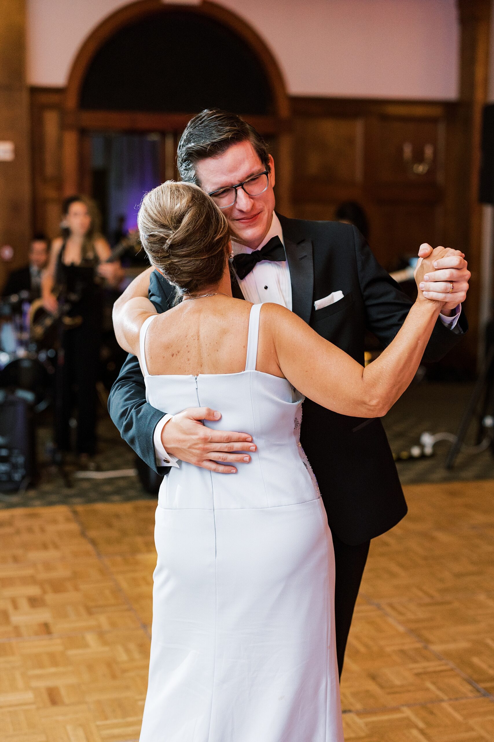 groom hugs mother to him at Skytop PA wedding reception