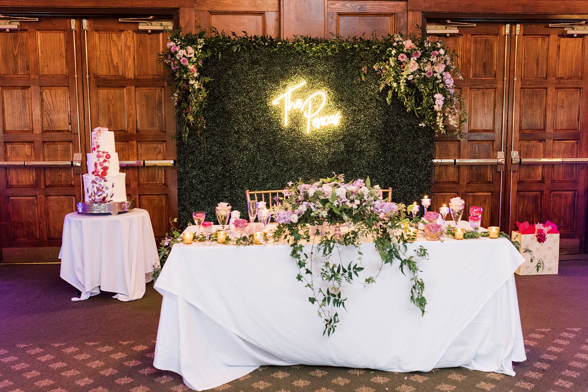 wedding reception with pink roses on table at Skytop Lodge with greenery table 