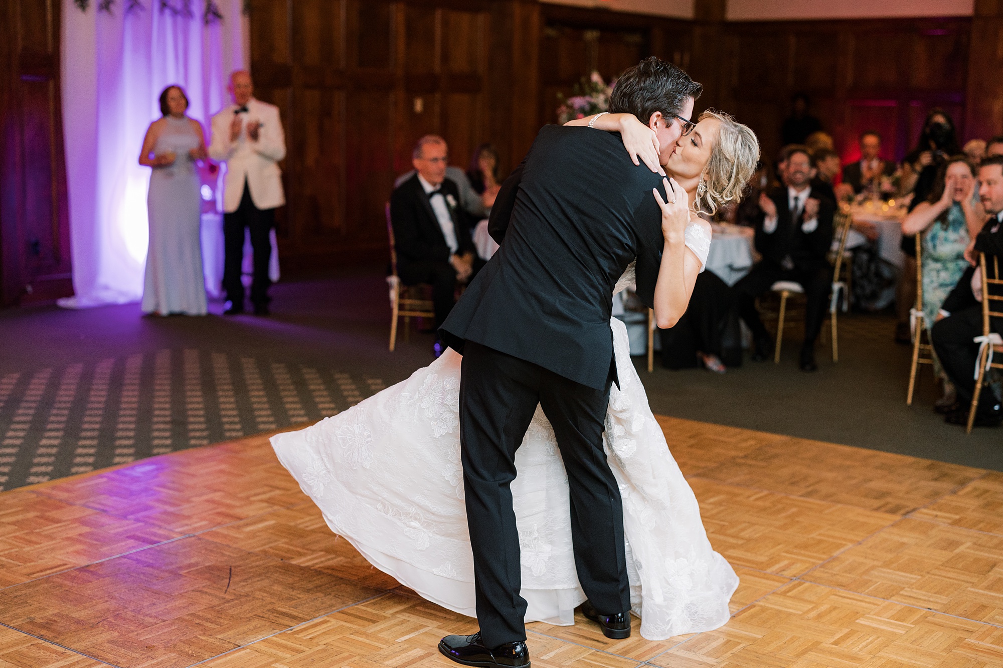 bride and groom kiss on dance floor in Skytop PA