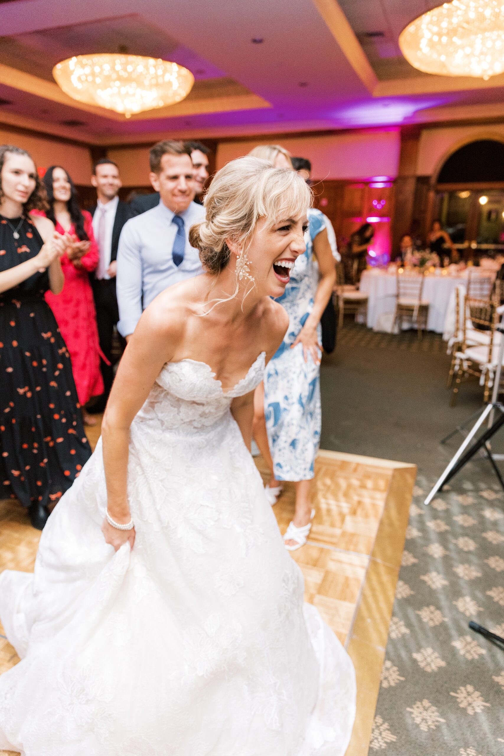 bride dances during wedding reception at Skytop Lodge with live band