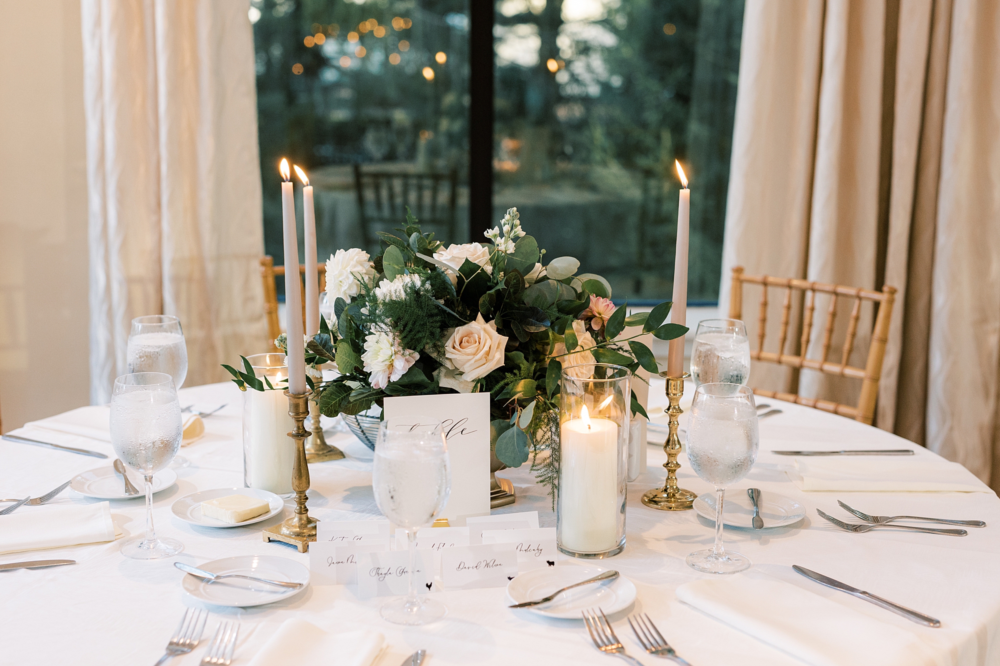 wedding reception with gold and ivory details at Aldie Mansion