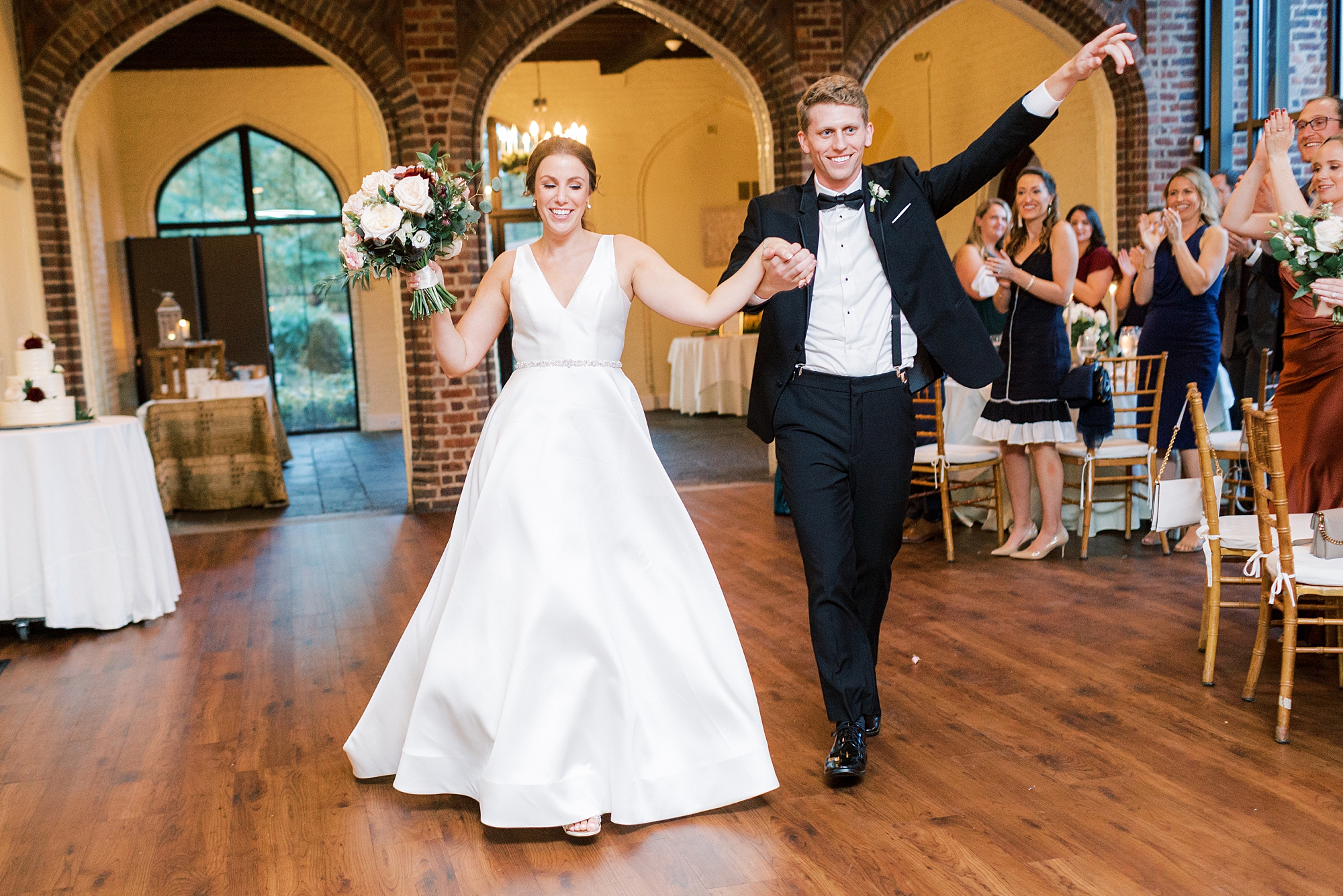 bride and groom dance into wedding reception at Aldie Mansion
