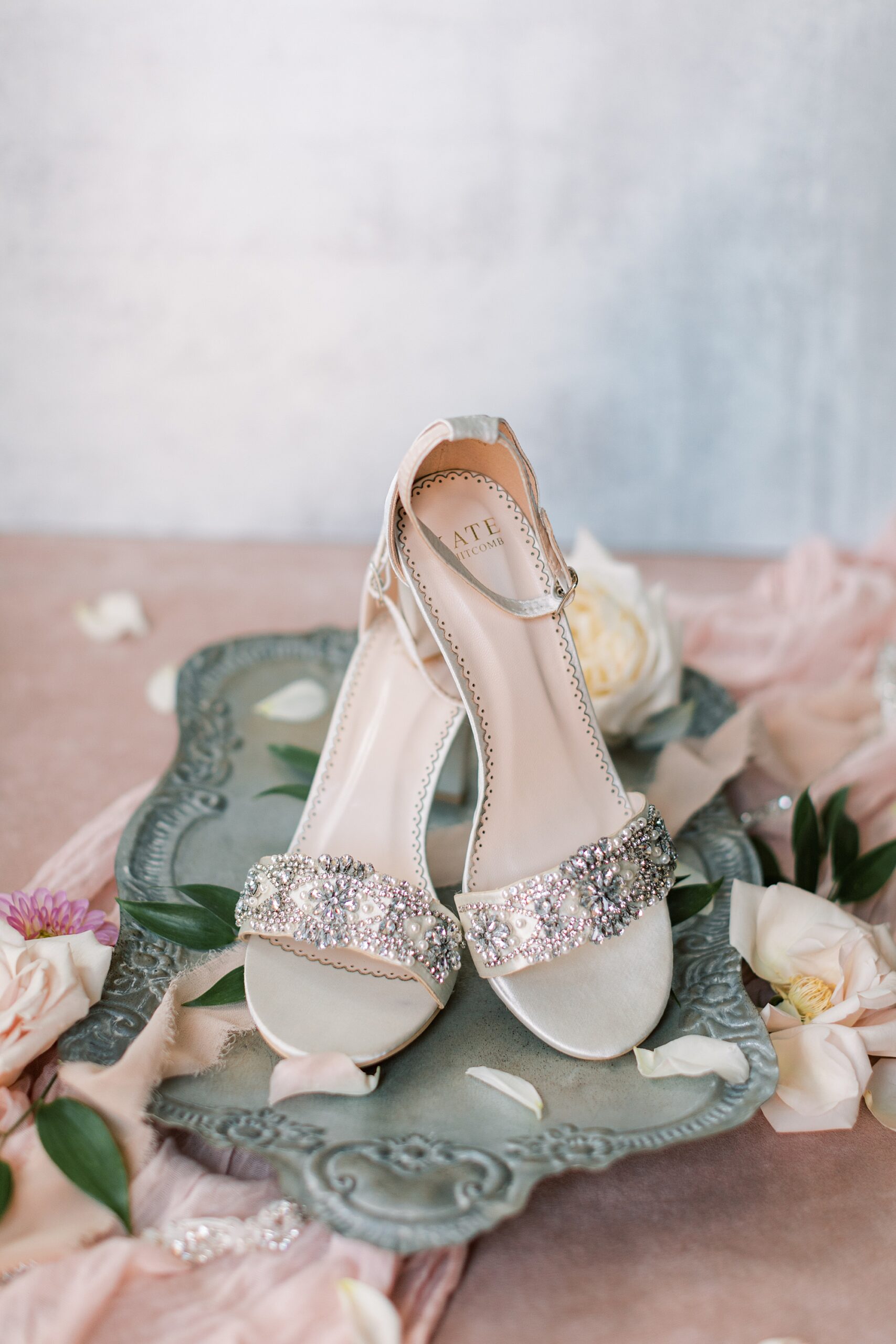 bride's silver shoes rest on tray before Aldie Mansion wedding