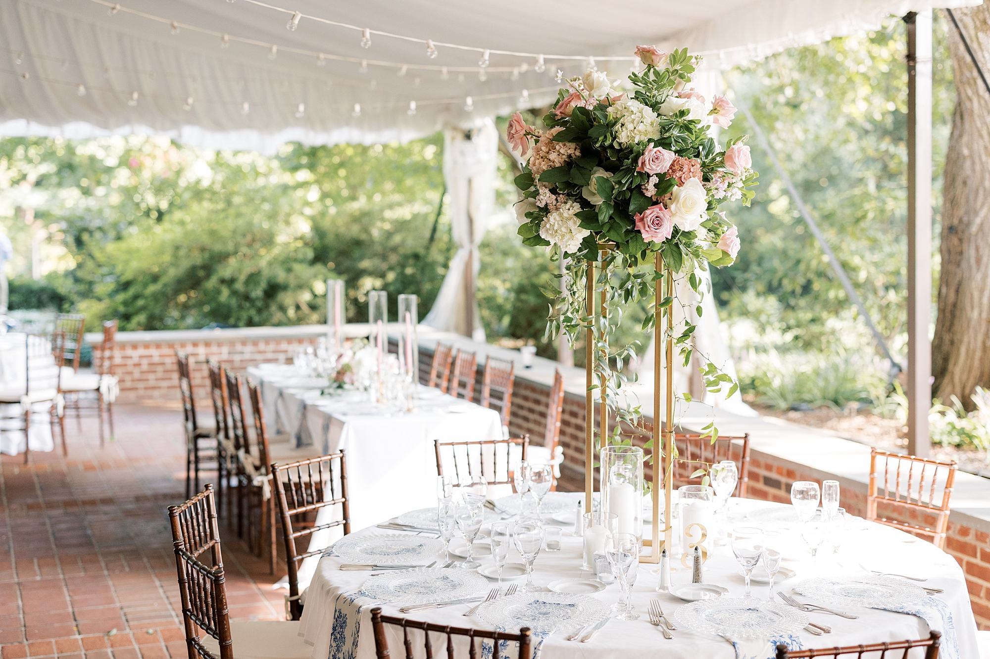 tented wedding reception on patio at Greenville Country Club